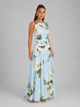 Vestido largo sin mangas con cuello barco y estampado floral para invitada de boda