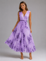 Vestido maxi plisado floral en línea A para invitada de boda