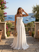 Vestido maxi texturizado y esculpido con flores para invitada de boda