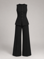 Conjunto de chaleco entallado negro y pantalón de pierna ancha
