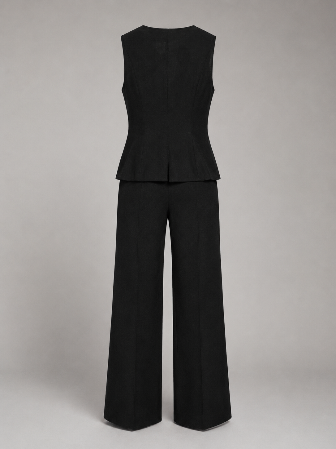 Conjunto de chaleco entallado negro y pantalón de pierna ancha