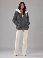 Doudoune à capuche doublée sherpa pour femme