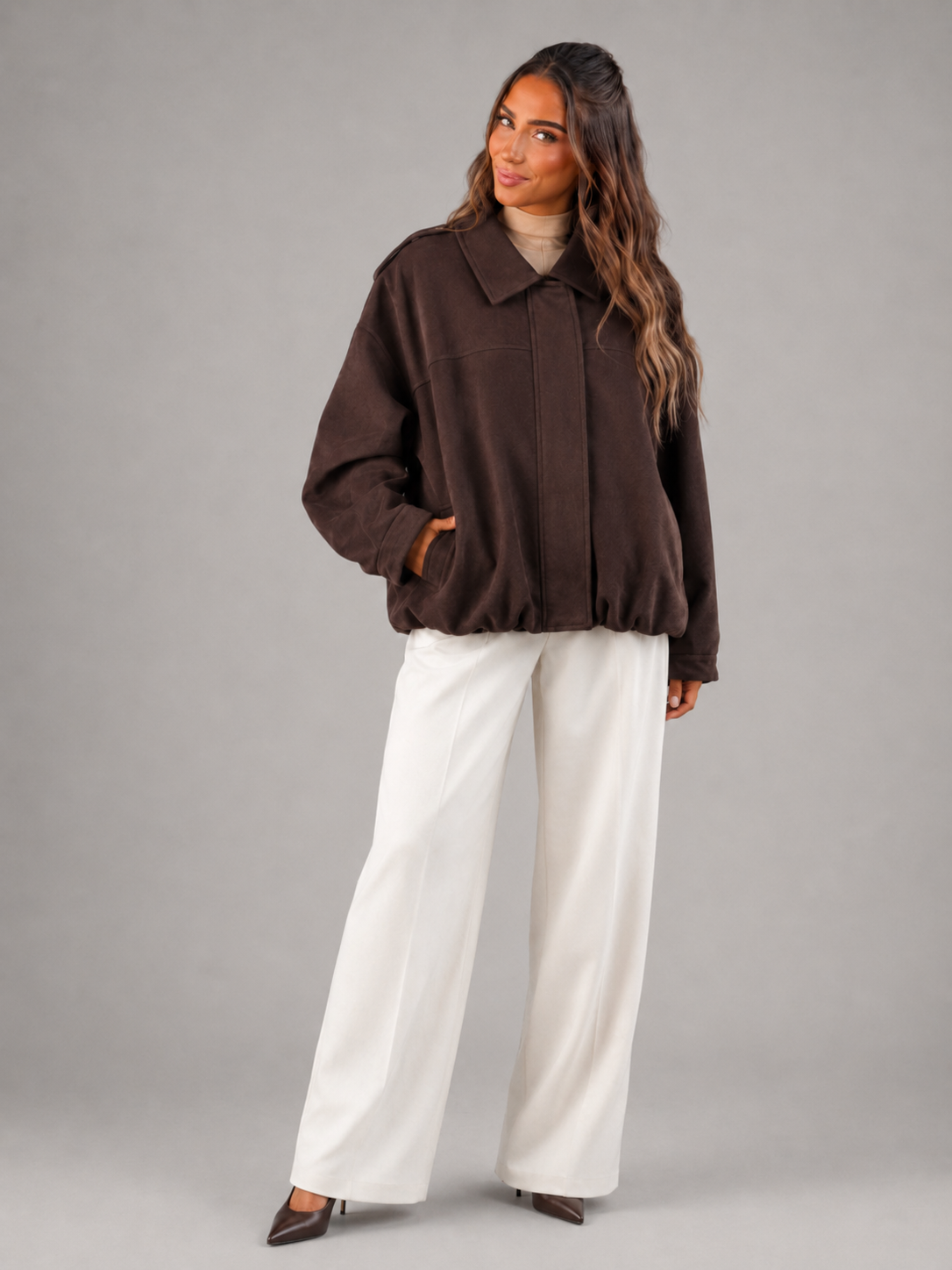 Faux suede oversized shirt jacket – fabric texture close-up – Nude & Nero