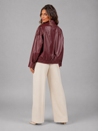 Faux leather bomber jacket – back view – Nude & Nero