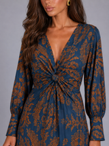 Vestido midi estampado con escote en V para invitada de boda