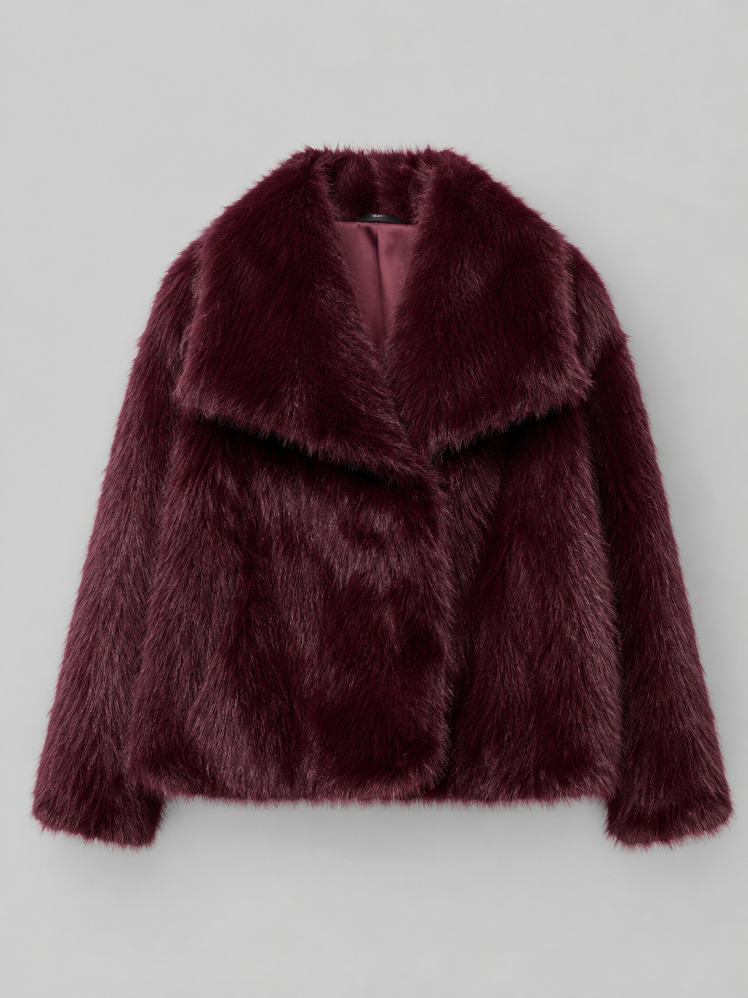 Cropped faux fur jacket – side view – Nude & Nero