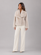 Cropped faux fur jacket – campaign shot – Nude & Nero